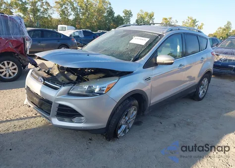 2014 Ford Escape Titanium z USA, uszkodzony, nr VIN 1FMCU9J93EUC80950